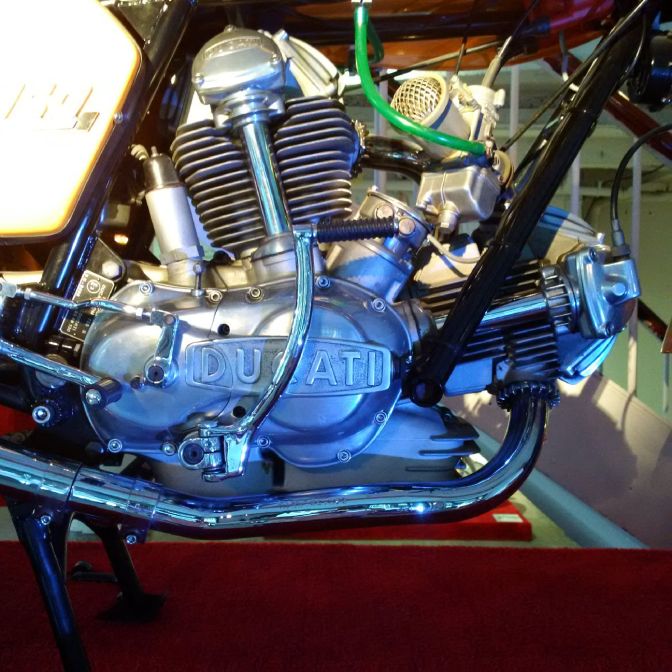 Tubes and gear covers for the bevel-drive valve system stand out on this 